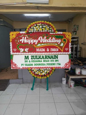 Papan Bunga di Bandara Badung
