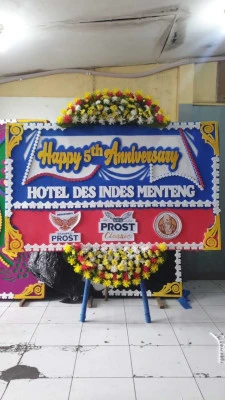 Papan Bunga di Bandara Badung