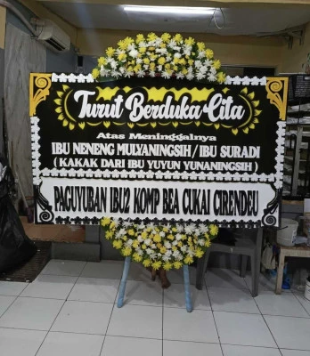 Papan Bunga di Bandara Badung