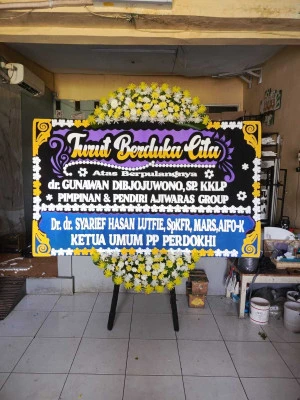 Papan Bunga di Bandara Badung